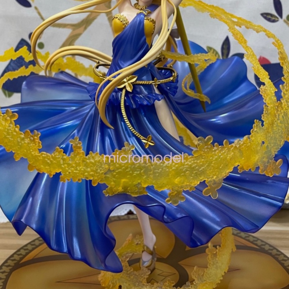 Blue and Yellow Flowing Dress Figurine
